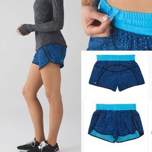 10 LULULEMON RUNNING SHORTS TRACKER BLUE BLACK ZIP POCKET DRAWSTRING W/ LINER